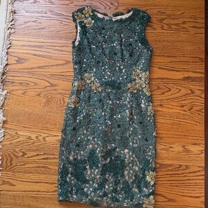 Elegant Green Lace Sheath Dress with Gold Floral Embellishments